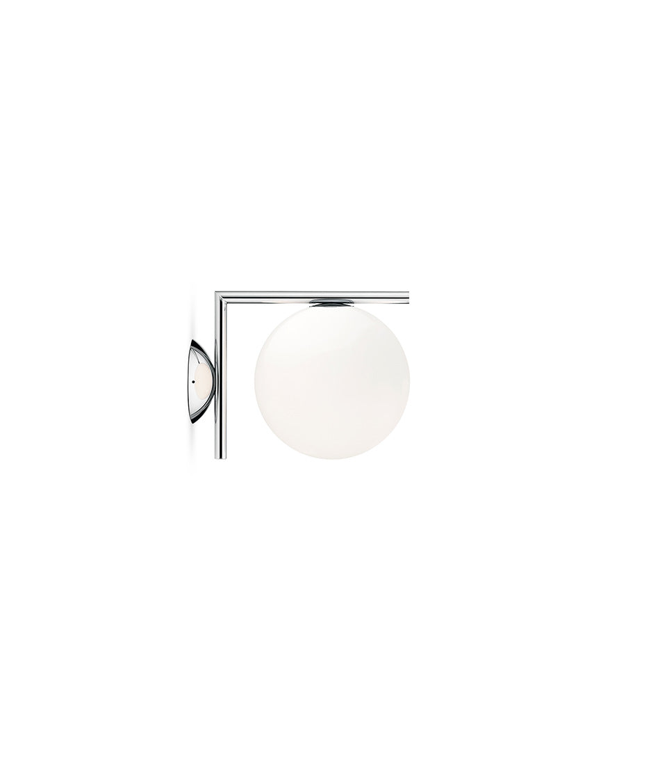Small Flos IC Lights Ceiling/Wall sconce. Chrome L-shaped body connected to opaque white glass spherical diffuser.