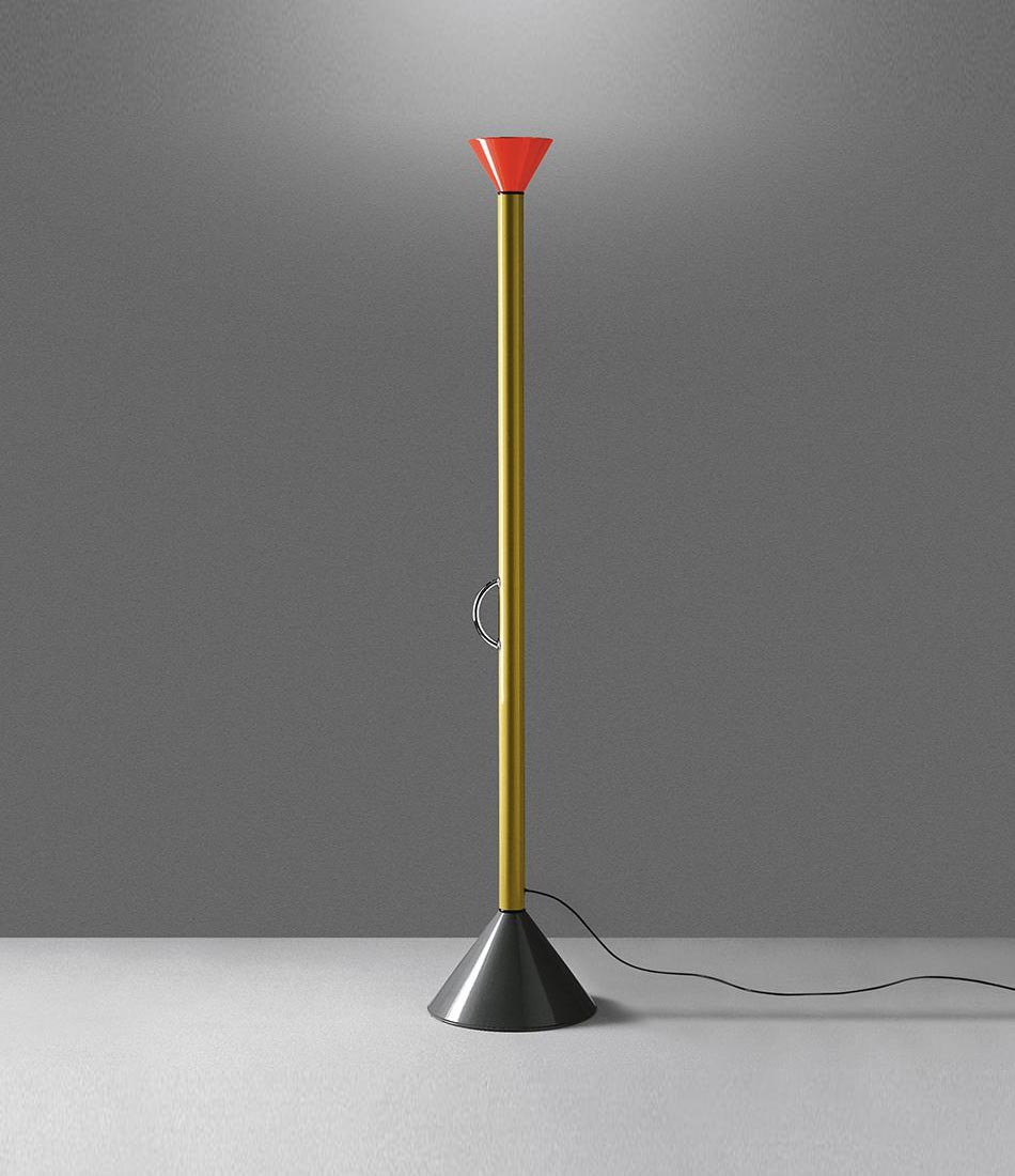 Artemide Callimaco floor lamp illuminating a bare room.