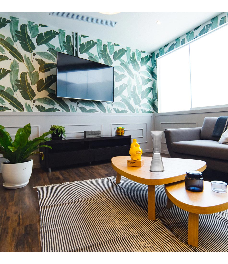 Artemide Come Together table lamp on a coffee table in the living room of a home.