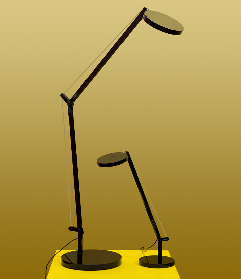 Artemide Demetra Professional LED table lamp on a platform next to Demetra Micro table lamp.