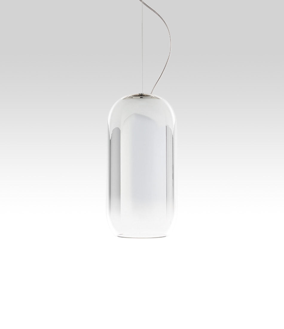 Pill-shaped Artemide Gople suspension lamp, with blown glass shade in gradient silver.