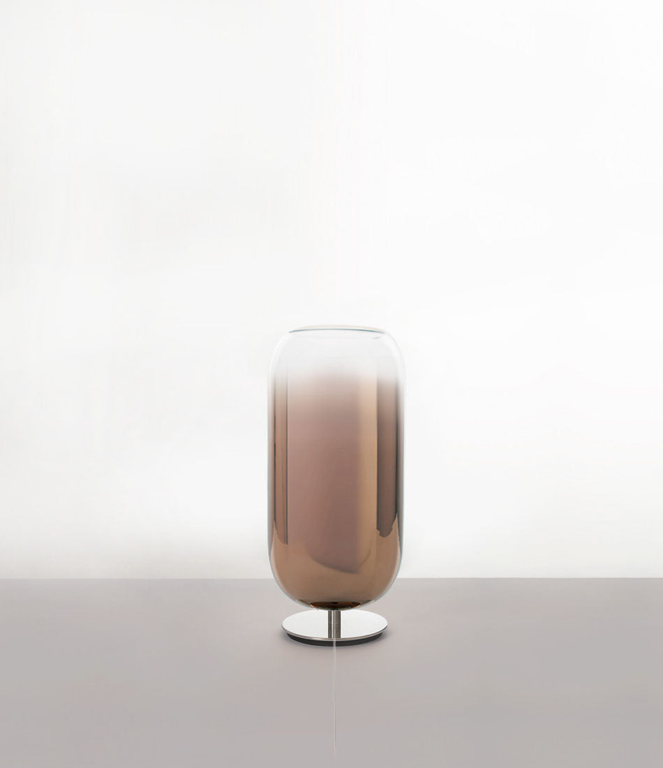 Artemide Gople Mini table lamp, with chrome steel base and blown glass pill-shaped shade in gradient bronze.