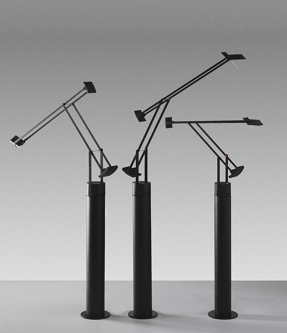 Three Artemide Tizio floor lamps, with lamp in three different positions.