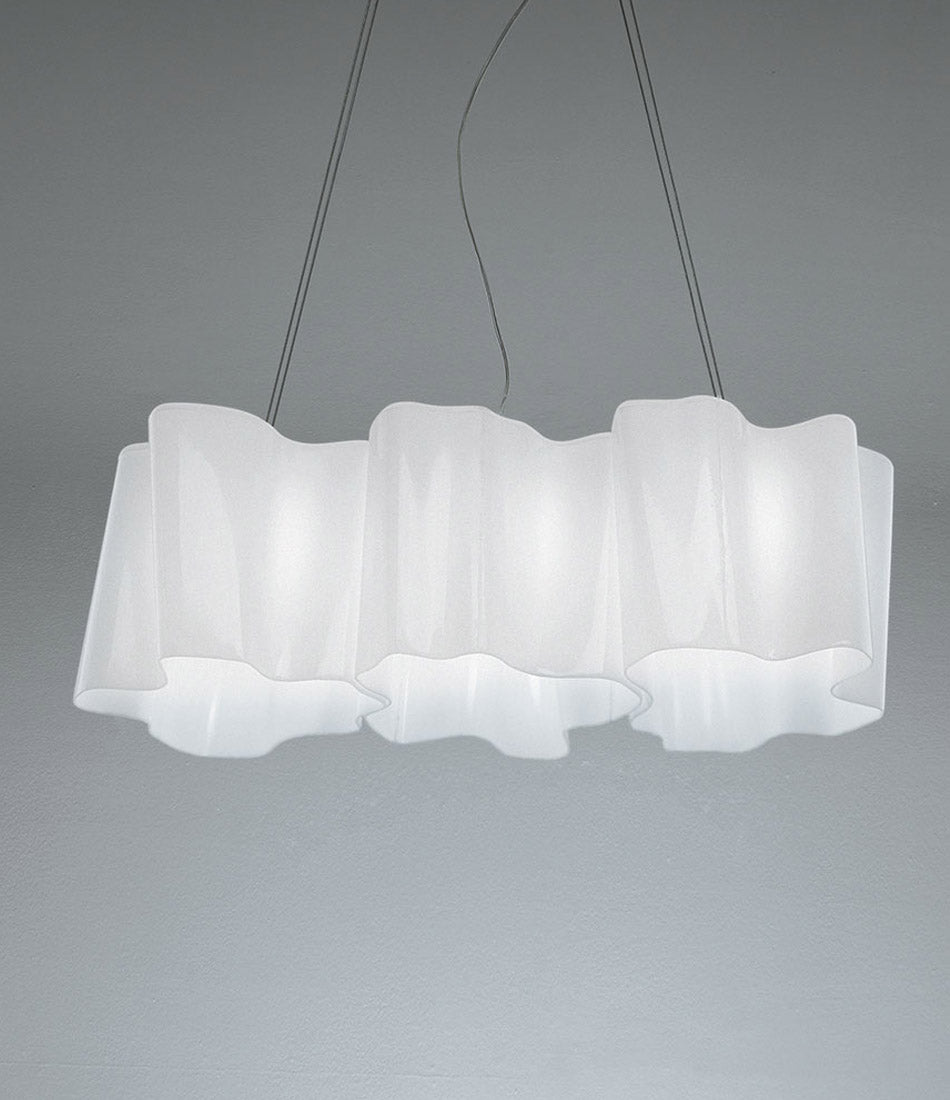 Artemide Logico triple suspension lamp in milky white finish. Mounted in-line.