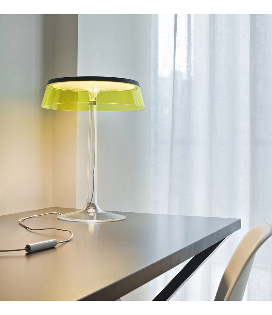 Flos Bon Jour table lamp on a work desk.