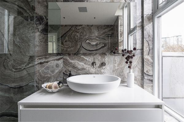 A primary ensuite built around a freestanding tub