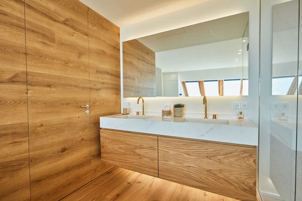 A primary bath refreshed with brushed brass hardware