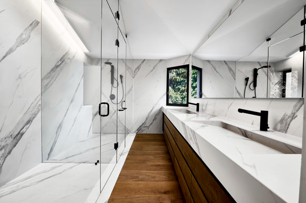 A powder room finished with matte black tapware
