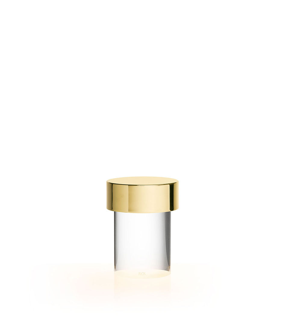 Flos Last Order table lamp in polished brass and clear diffuser.