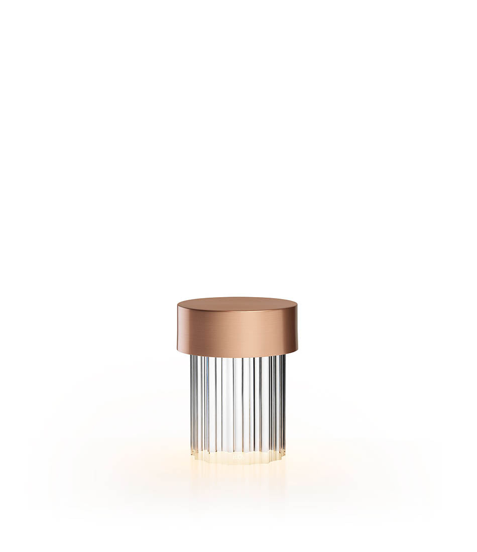 Flos Last Order table lamp in satin copper and fluted diffuser.