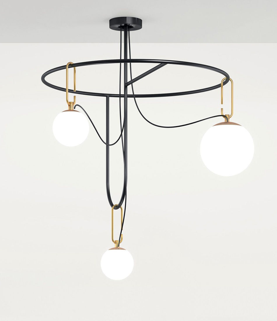 Artemide NH S4 suspension lamp mounted to a ceiling.