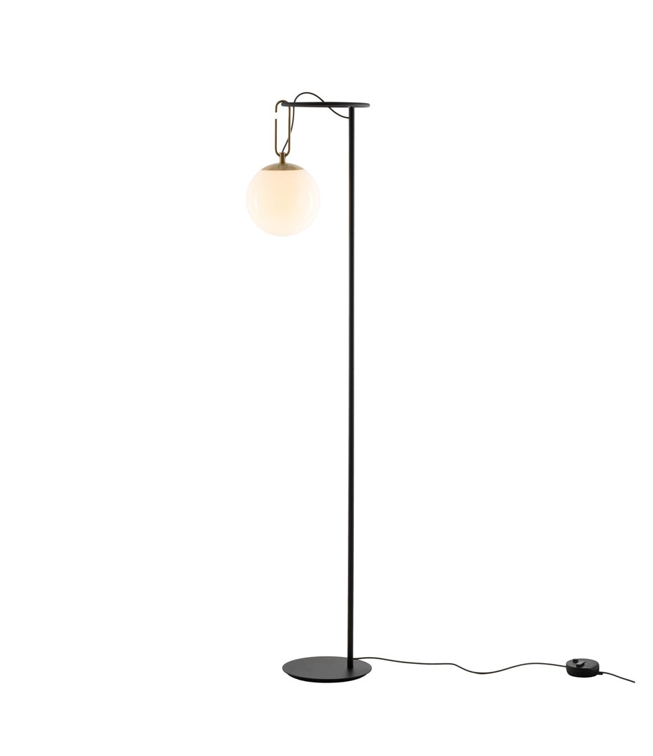 Artemide NH floor lamp, with blown glass globe diffuser hanging from black stem with oval-shaped hook.