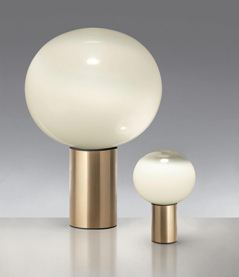 Artemide Laguna 16 and Laguna 37 table lamps in satin brass finish, side by side.