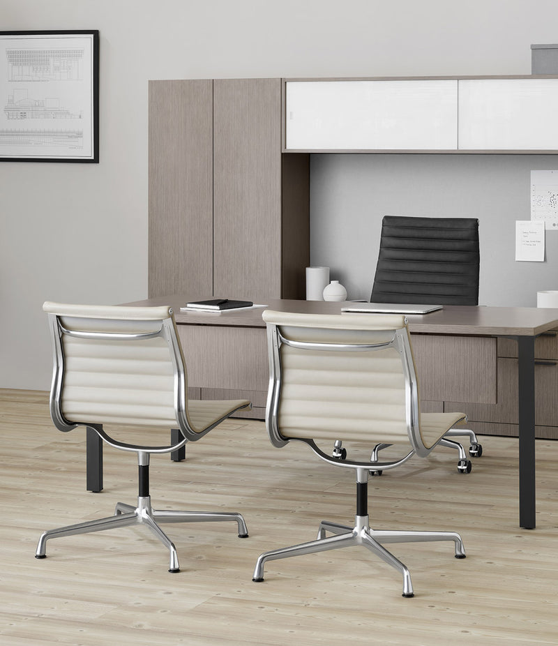 Eames Aluminum Group Executive Chair in Black Leather,  Guest Chairs in Alpine Leather.