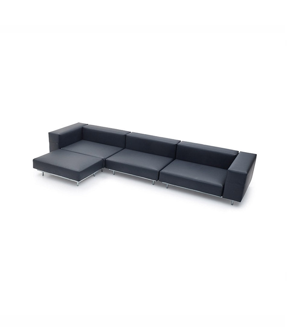Black Extremis Walrus foot stool with complete black Walrus sofa configuration.