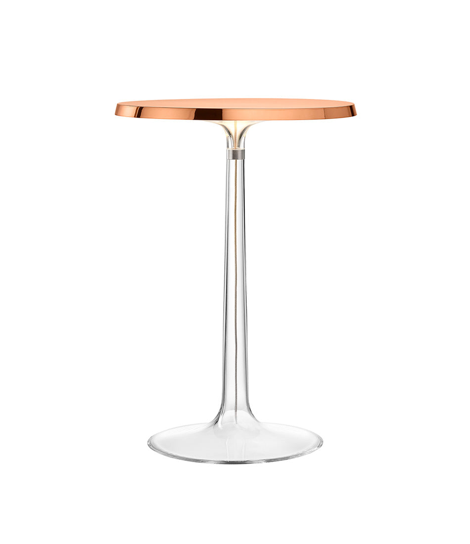 Flos Bon Jour table lamp, with transparent stem and flat disc light diffuser in matte copper.