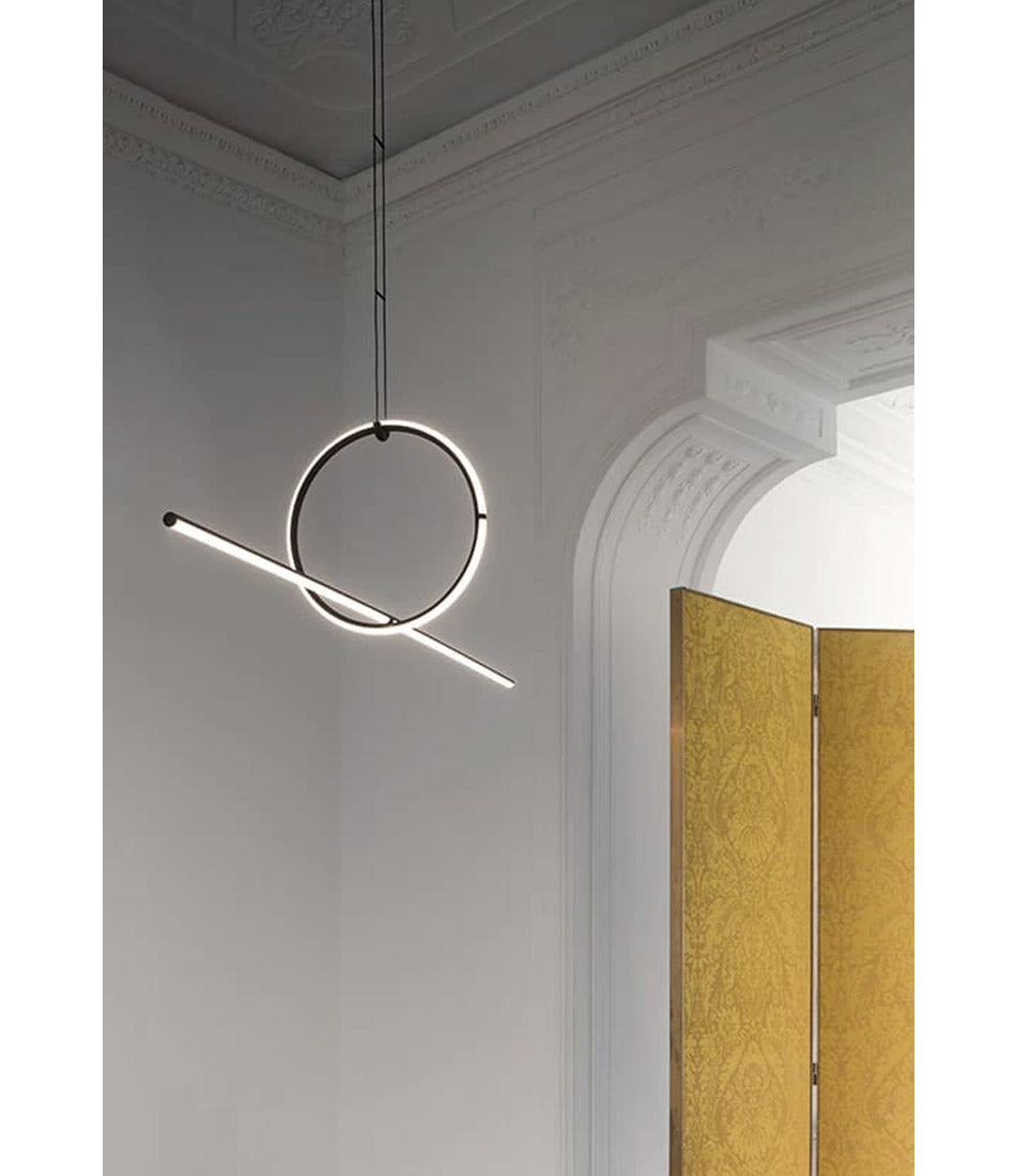 Flos Arrangements Pendant Light 2 hanging from a high ceiling in a classical room.