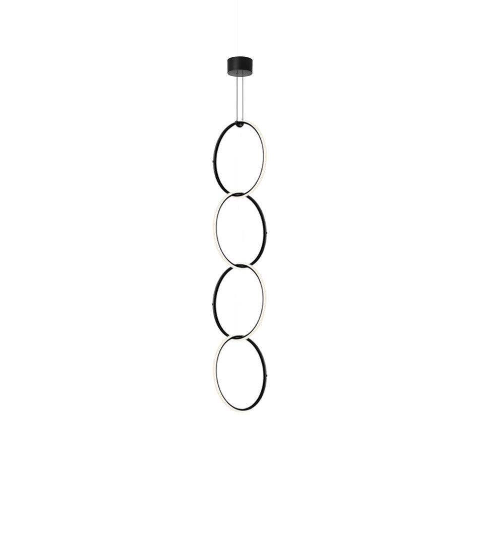 Flos Arrangements Pendant Light 6. Four circular LED light fixtures interlinked in a chain to form a single fixture.