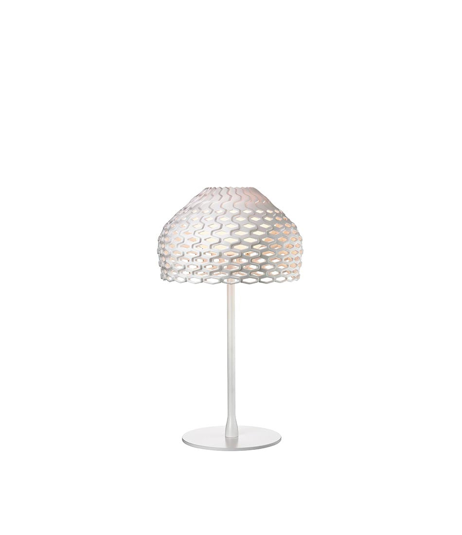 Flos Tatou table lamp in white, with perforated lampshade.