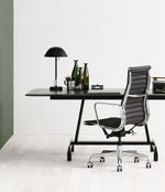 Eames Aluminum Group Executive Chair in Black Leather and Chrome Frame.